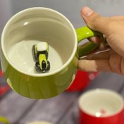 تصویر ماگ عروسکی کیفیت درجه ۱ طرح سبز 