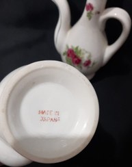 تصویر جفت گلاب پاش گلسرخی ژاپن 