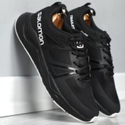 تصویر کتونی مردانه سالامون مشکی زیره سفید 