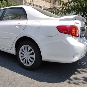 تصویر قالپاق تویوتا کرولا سایز 16 مناسب رینگ و لاستیک فابریک چرخ ماشین Toyota Corolla gli مدل 2008 2009 