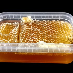 تصویر عسل باموم طبیعی 