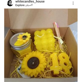 تصویر جعبه‌ای شمع های زرد 