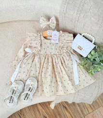 تصویر پیراهن طرحدار چین دار بچگونه 