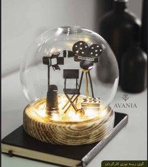 تصویر گوی شیشه ای کارگردان 