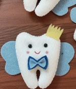 تصویر سیسمونی نوزادی گیفت دندونی پاپیون دار نمدی 