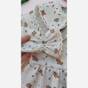 تصویر پیراهن گلناز مدل یقه ب ب گل نارنجی 