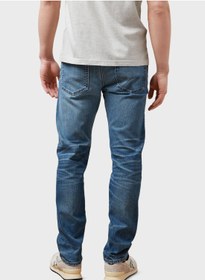 تصویر جین‌های جذب با رنگ آبی روشن فِلکس برند american eagle Flex Light Wash Slim Fit Jeans