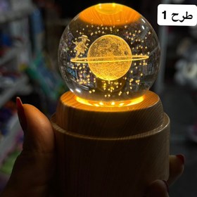 تصویر گوی کریستالی چرخان ۱۰ سانت - طرح 1 