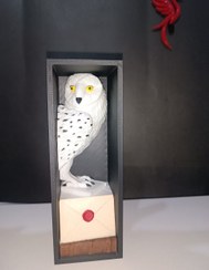 تصویر نگهدارنده کتاب هدویگ جغد هری پاتر 