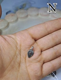 تصویر پلاک طرح برگ فلزی 