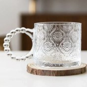 تصویر لیوان دسته مرواریدی طرح گل ۳۲۰ میلی لیتر 