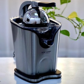 تصویر آب مرکبات گیر نیولند مدل NL-2502S 