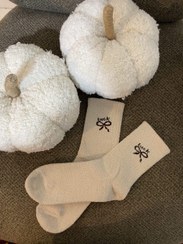 تصویر جوراب حوله‌ای پاپیونی 