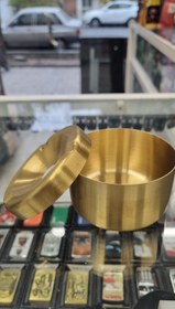 تصویر زیر سیگاری فلزی طلایی 