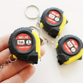 تصویر جاکلیدی متر | طراحی چندمنظوره | سبک و کاربردی Measuring Tape Keychain | Multi-Functional Design | Lightweight & Practical