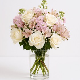 تصویر دسته گل صورتی و سفید در گلدان شیشه‌ای کد57 (امارات) 