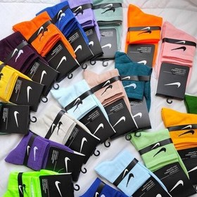 تصویر جوراب نیمساق نایک زرشکی nike socks