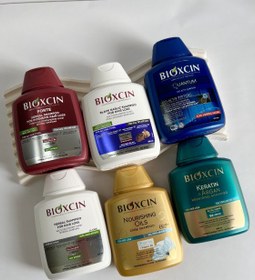 تصویر شامپو ضد ریزش بیوکسین ترمیم کننده حاوی کراتین و آرگان حجم پک 2عددی ۳۰۰ میل (اصلی -واردات قانونی -ارسال از منطقه آزاد ارس) 