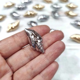 تصویر دکمه دفرمه طرح گوش ماهی 