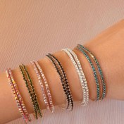 تصویر دستبند تنیسی کشی رنگ فیروزه ای با نگین نقره ای 