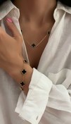 تصویر ست گردنبند و دستبند ونکلیف طلایی نگین مشکی 