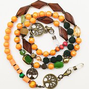 تصویر بندعینک دستساز آتوسا بلتاگالری با آویزهای درخت زندگی 