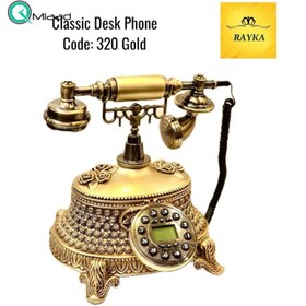 تصویر تلفن سلطنتی رومیزی رایکا مدل 320، تلفن سلطنتی با طراحی طرح نقش برجسته روی بدنه تلفن، شماره گیر دکمه ای و دارای کالر آیدی، دکوری شیک و جذاب مناسب منزل و محل کار| رنگ طلایی 