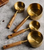 تصویر پیمانه اندازه گیری شیک مدل گرد با دسته چوبی 