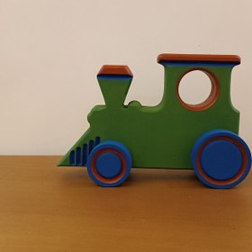 تصویر لوکوموتیو چوبی چرخدار متحرک مناسب اسباب بازی کودک و سیسمونی 