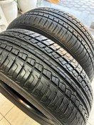 تصویر لاستیک 205/60/14 نکسن کره کارکرده در حد 90% آجدار 