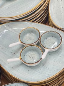 تصویر مزه خوری دسته دار 