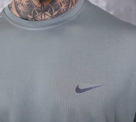 تصویر ست تیشرت و شلوارک ورزشی نایک - سبز زیتون / XL 