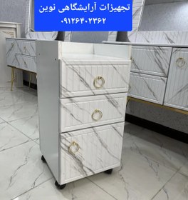 تصویر ترولی آرایشگاهی چوبی وکیوم دررنگ بندی سفیدومشکی ساده وطرح سنگ 