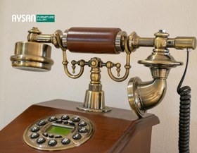 تصویر تلفن رومیزی کد 13 