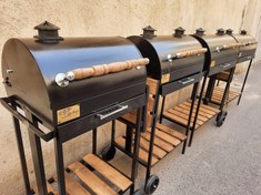 تصویر باربیکیو ذغالی محمد سایز ۵۰ تا ۱۰۰ سانت با ۴ چرخ و میز کنار تاشو 