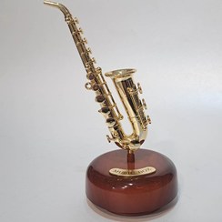 تصویر دکوری موزیکال ساکسیفون و ترومپت پایه دار 