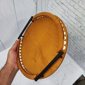 تصویر سینی چوبی مهره دار گرد 