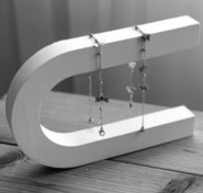 تصویر استند جواهرات کمان 