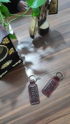 تصویر جاکلیدی طرح اسلیمی رنگ زرشکی 