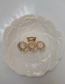 تصویر کلیپس فلزی طلایی 