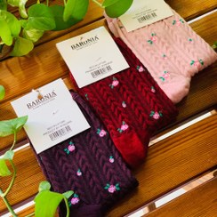 تصویر جوراب ساق‌بلند گلدار 