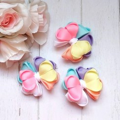 تصویر گلسر دخترانه عمده ، مدل رنگین کمانی ، پشت گلسرها گیره دارن. حداقل سفارش 12 عدد 