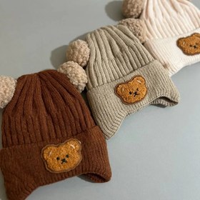 تصویر کلاه بچگانه تدی دو پوم تدی داخل آستر‎ - قهوه ای Children's teddy hat with two teddy poms inside the lining