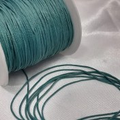 تصویر نخ دستبند | نخ تسبیح | سبز فیروزه ای تیره (بسته 5 متری ) 