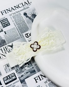 تصویر هدبند توری طرح دار 