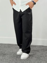 تصویر شلوار نیم بگ مردانه مشکی پلیسه دار ترند ۲۰۲۵ 