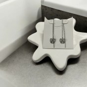 تصویر گوشواره بخیه ای استیل ماه طلایی 