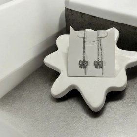 تصویر گوشواره بخیه ای استیل ماه طلایی 