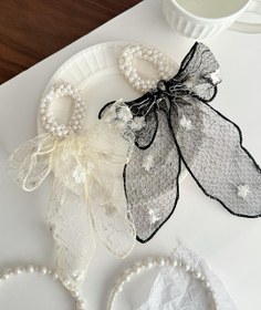 تصویر کش مرواریدی دانتل 