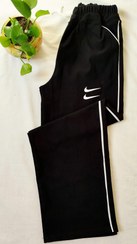 تصویر شلوار زنانه بغل خط دار نایک کد ۲۰۷۹ Woman's Nike pants 2079